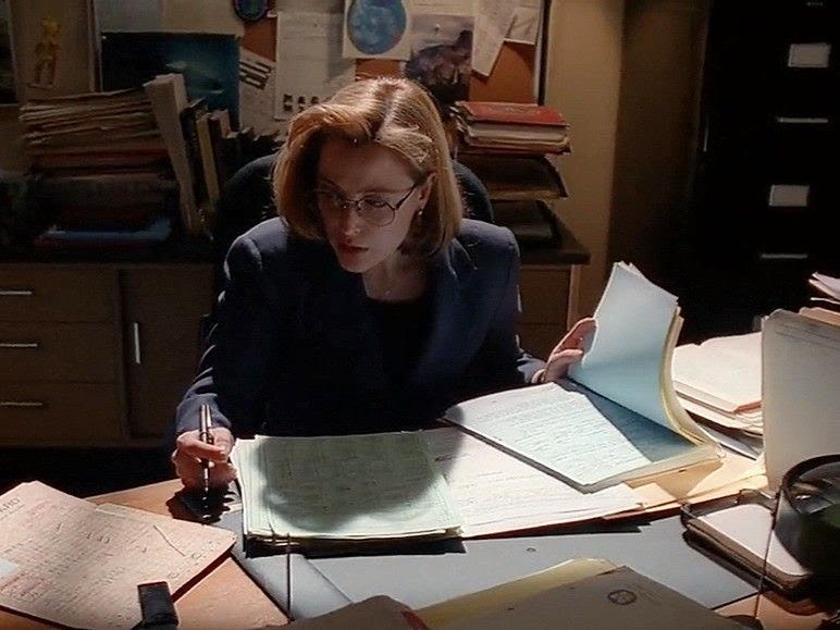 scully reading some files
